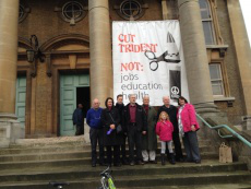 St Mellitus banner reads: 'Cut Trident, not jobs, education and health'