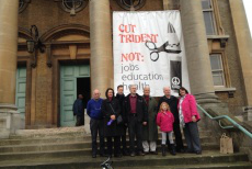 St Mellitus banner reads: 'Cut Trident, not jobs, education and  health'