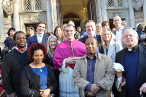 Bishop John Arnold, Canon Stuart Wilson with parishioners outside Westminster Cathedral