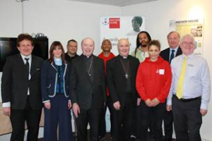 left - right: Guy Insull, (Appeal Director),  Revd Chantal Mason, Hassan (resident), Bishop Thomas McMahon, Richard (resident), Bishop Stephen  Cottrell, Warren  and Lavina (residents), Philip Tolhurst and Keith Fernett (Director,  Caritas Anchor House)