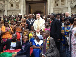 Bishop Patrick with congregation after Mass