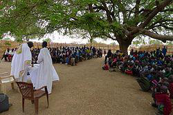 Sunday Mass under a tree at Romic in Warrap State,  South Sudan