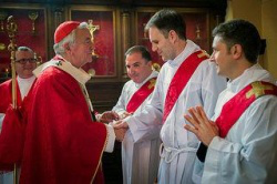 Cardinal Nichols greets the new priests
