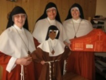Mother Damian, Sr Bakhita & 'Sr Josephine' with  Sr Anezka holding a model of the monastery chapel for children to put prayer intentions in