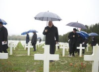 Visiting graves of fallen soldiers