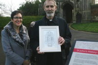 Francoise Guild with her sketch and Bishop Alan Williams