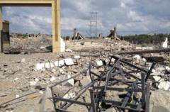 Scene of desolation in one former residential area. - image Caritas