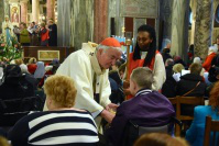 Cardinal Nichols anointing the sick