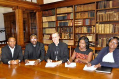 Bishop Hudson with Fr Akono & staff 