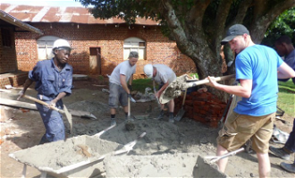 Volunteers working on a building project in Uganda