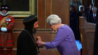  Bishop Angaelos receives OBE from HM the Queen