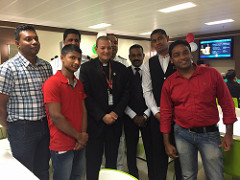Bishop Joseph with some crew members