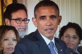Obama with some relatives of those killed in mass shootings recently