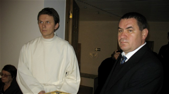 Peter Humeniuk , right, during service marking 10th anniversary of consecration of Cathedral St Peter and Paul in Saratov