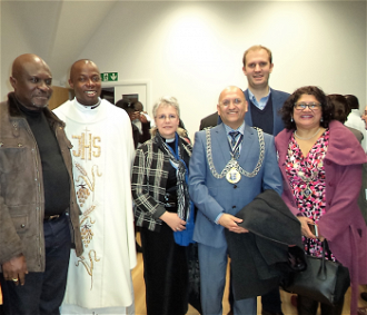 Fr Julius with brother Michael, Rev Susan van Beuren,Mayor and Mayoress of the Royal Borough of Kingston and James Berry MP 