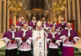Back row from left, Canon Rollings, Canon Paul, Canon Harkness, Canon George, Canon Bagstaff. Front row from left, Canon Blakesley, Canon Hackeson, Bishop Alan, Canon Minh, Canon Leeming.