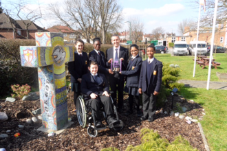 Mr Prindiville, Headteacher with pupils Valentina Cerquera, Stephanie Aina, Melissa Da Costa, Emmanuel Utubor, Jack O'Donnell