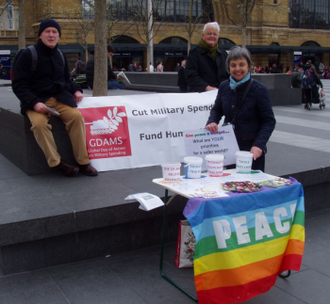 Pat Gaffney of Pax Christi,  Bruce Kent, Vice President & member Peter McNamara outside Kings Cross station