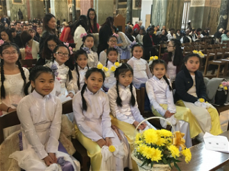 Vietnamese children's dance group at the Mass