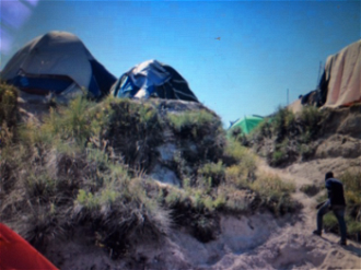 Tents among sand dunes