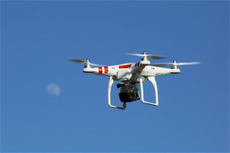 Equipped with digital camera - this drone provides a birds eye view of church rooftops 