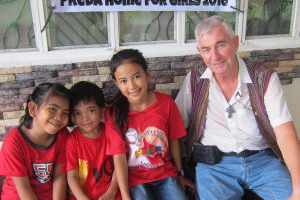 Fr Shay with some of the rescued children