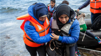 Syrian woman arriving at Lesbos