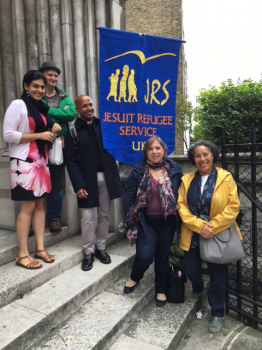 Before the march - JRS group with Sarah Teather (2nd rt) on steps of St James