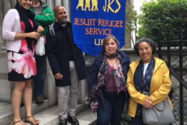Before the march - JRS group with Sarah Teather (2nd rt) on steps of St James
