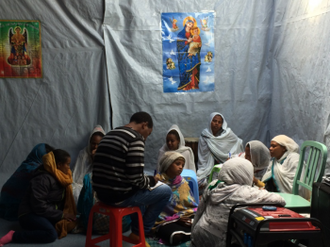 Prayers in camp's Eritrean Church pic ICN