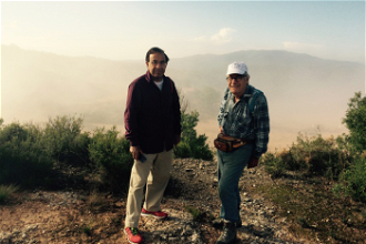 Hossein and Bill with Montserrat on the horizon