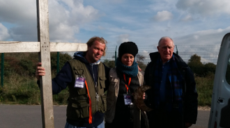 Br Johannes, Marie-Christine and Fr Joe with the cross and crescent from the demolish church and mosque