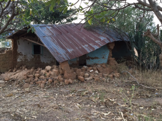 remains of a Christian house fire bombed by Boko Haram. The inhabitants were killed in the attack.