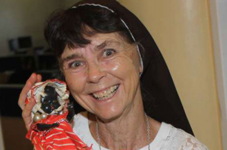 Sr Patricia with doll Sunshine - picture Anthony Omuya