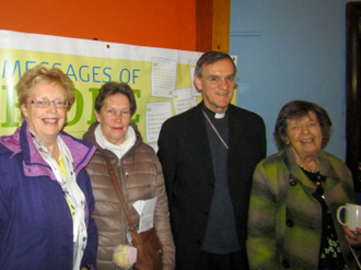 Bishop John Arnold with participants at a recent 'Welcome the Stranger CAFOD event  