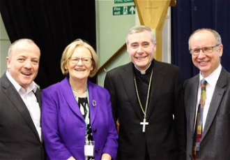 L-R: Mike Kane, MP, Mary Kilcoyne, Bishop Mark Davies,  Phil McCarthy