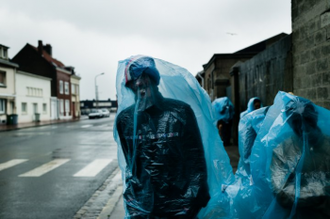 Chlldren keep dry in plastic bags