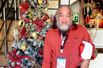 Kidnapped priest Fr Chito (pictured last Christmas)
