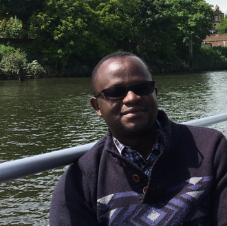 Fr Denis Odongo during his London visit