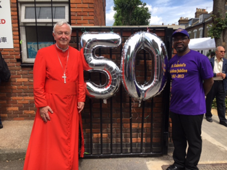 Cardinal Vincent Nichols with parishioner