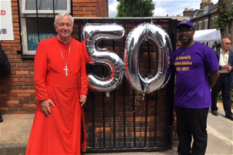 Cardinal Vincent Nichols with parishioner