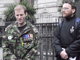 Veteran Ben Griffin with Fr Martin at alternative Remembrance Day vigil