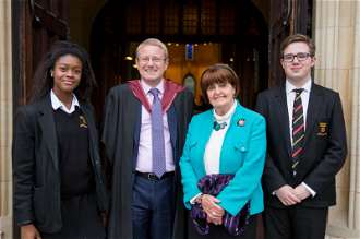 Baroness Cox with Headmaster, Andrew Johnson, and Head Boy and Girl, Lorcan O'Brien and Jolie Bediako