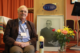 Julian Filochowski with picture of Bl Oscar Romero