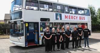 Mercy Bus and crew