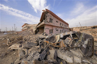 Destroyed homes in Qaraqosh ©.Jaco Klamer ACN