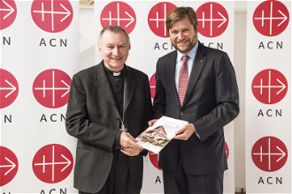 Vatican Secretary of State Cardinal Pietro Parolin with ACN's international general secretary Philipp Ozores