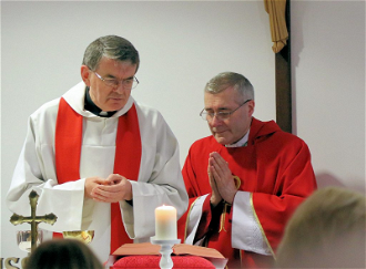 Photo of Canon Michael Gannon with Bishop Mark Davies by Simon Caldwell