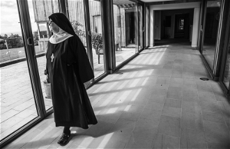 Mother Abbess Andrea walking in Stanbrook Abbey