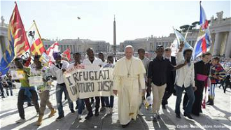 Pope with refugees in St Peter's Square
